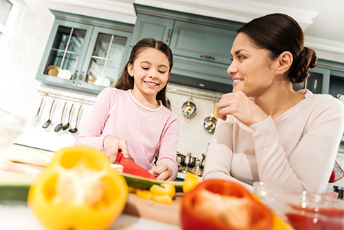 Mother and daughter in the kitchen